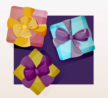 Renkli kurdeleler ve yaylar ile parlak hediye kutuları