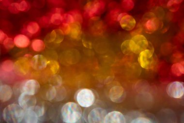 Kırmızı ve altın bokeh arka plan