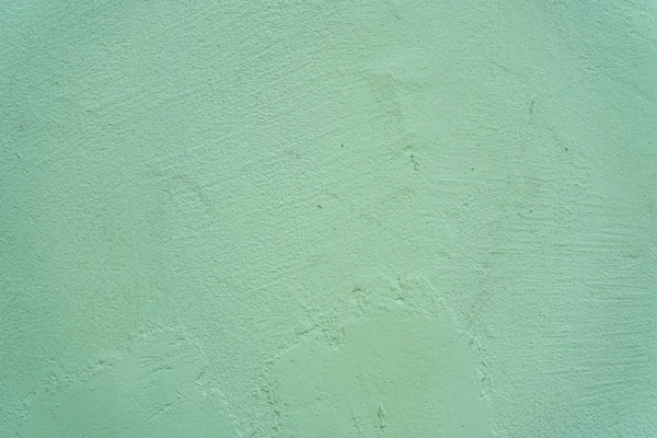 A zöld festett fal textúra közelről — Stock Fotó