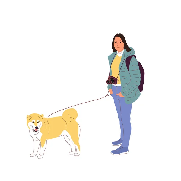 Giovane ragazza sta camminando con un cane shiba inu al guinzaglio. Isolato — Vettoriale Stock
