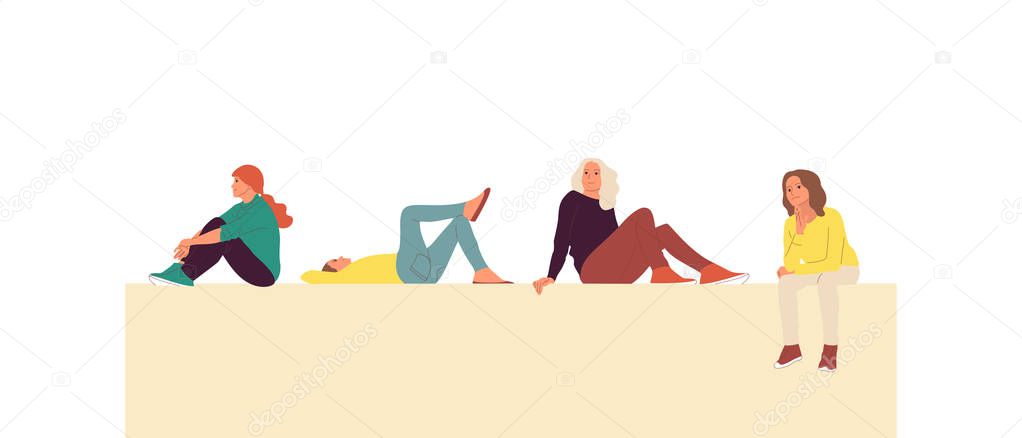 Four young girls are sitting and lying on the wall. Isolated on white background