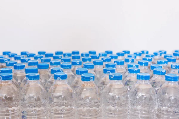 Rows of water plastic bottles and cap seal NSF us standard