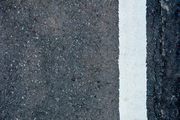 White line on black asphalt road background with copy space — Stock Photo, Image