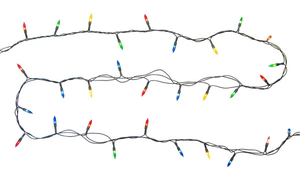 Corda de luzes de Natal isolado no fundo branco com cli — Fotografia de Stock