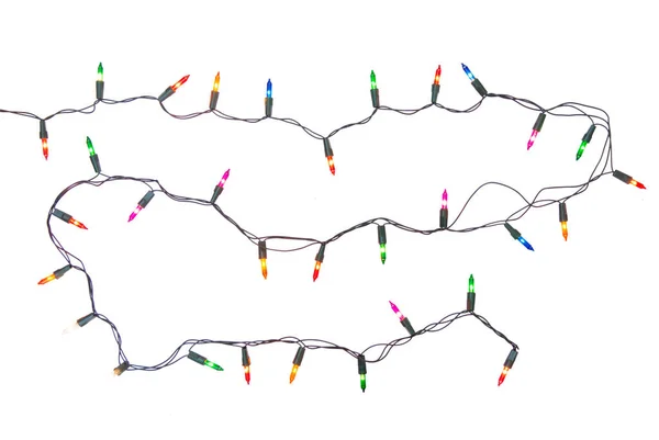 Нить рождественских огней изолированы на белом фоне с Кли — стоковое фото
