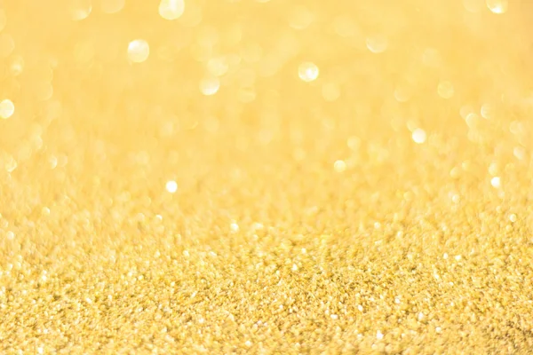 Oskärpa guld glitter bakgrund. Guldabstrakt bokeh backgroun — Stockfoto