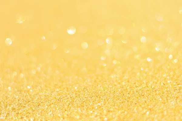 Oskärpa guld glitter bakgrund. Guldabstrakt bokeh backgroun — Stockfoto