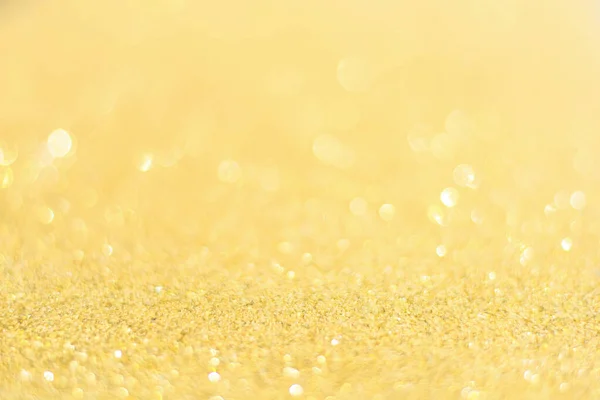 Oskärpa guld glitter bakgrund. Guldabstrakt bokeh backgroun — Stockfoto