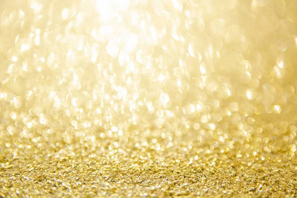 Oskärpa guld glitter bakgrund. Guldabstrakt bokeh backgroun — Stockfoto