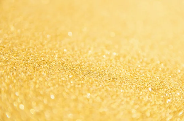 Fundo de brilho de ouro desfocado. Ouro abstrato bokeh backgroun — Fotografia de Stock