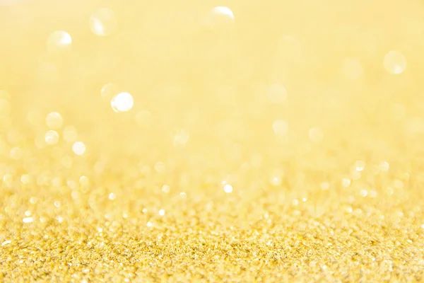 Oskärpa guld glitter bakgrund. Guldabstrakt bokeh backgroun — Stockfoto