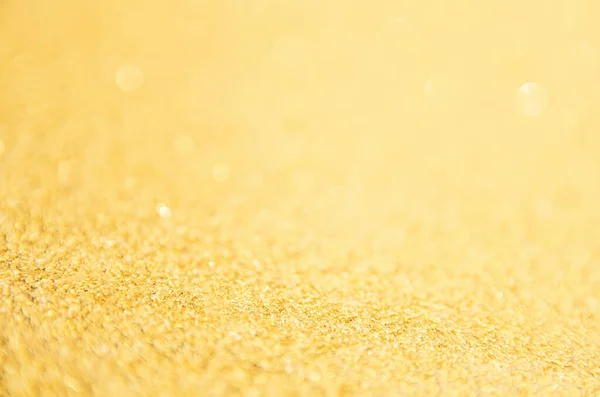 Oskärpa guld glitter bakgrund. Guldabstrakt bokeh backgroun — Stockfoto