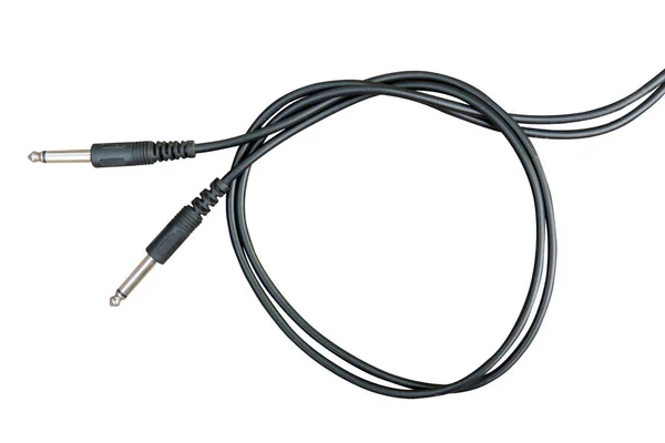Conector de audio de guitarra con cable negro aislado sobre fondo blanco —  Fotos de Stock
