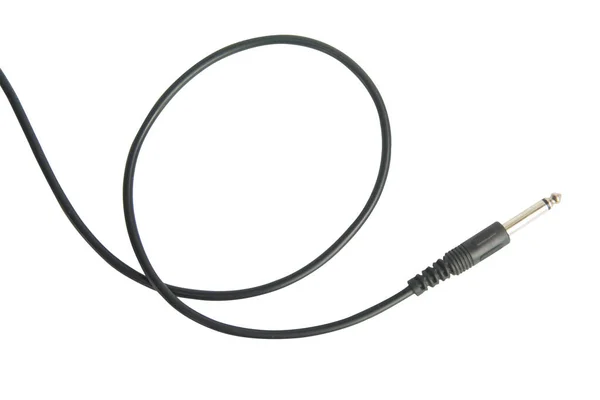 Conector de audio de guitarra con cable negro aislado sobre fondo blanco —  Fotos de Stock