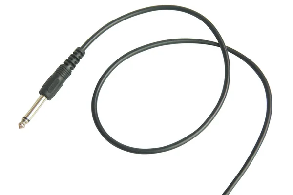 Conector de audio de guitarra con cable negro aislado sobre fondo blanco — Foto de Stock