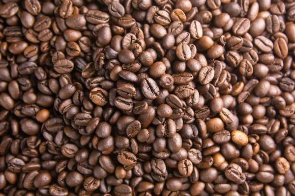 Grains de café torréfiés fond, Grains de café brun pour peut être u — Photo