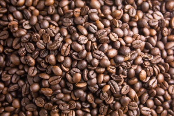 Grains de café torréfiés fond, Grains de café brun pour peut être u — Photo