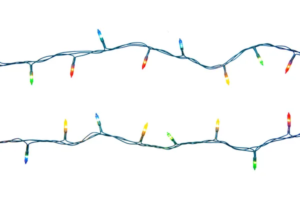 Beyaz arka planda izole edilmiş Noel ışıkları dizisi