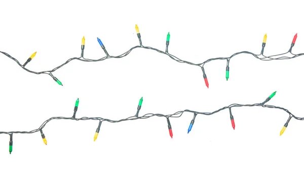 Corda de luzes de Natal isolado no fundo branco com cli — Fotografia de Stock