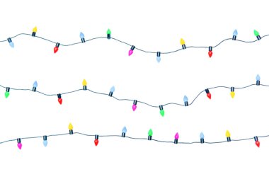 Noel ışıkları beyaz arka planda izole edilmiş bir şekilde kırpıştırılıyor