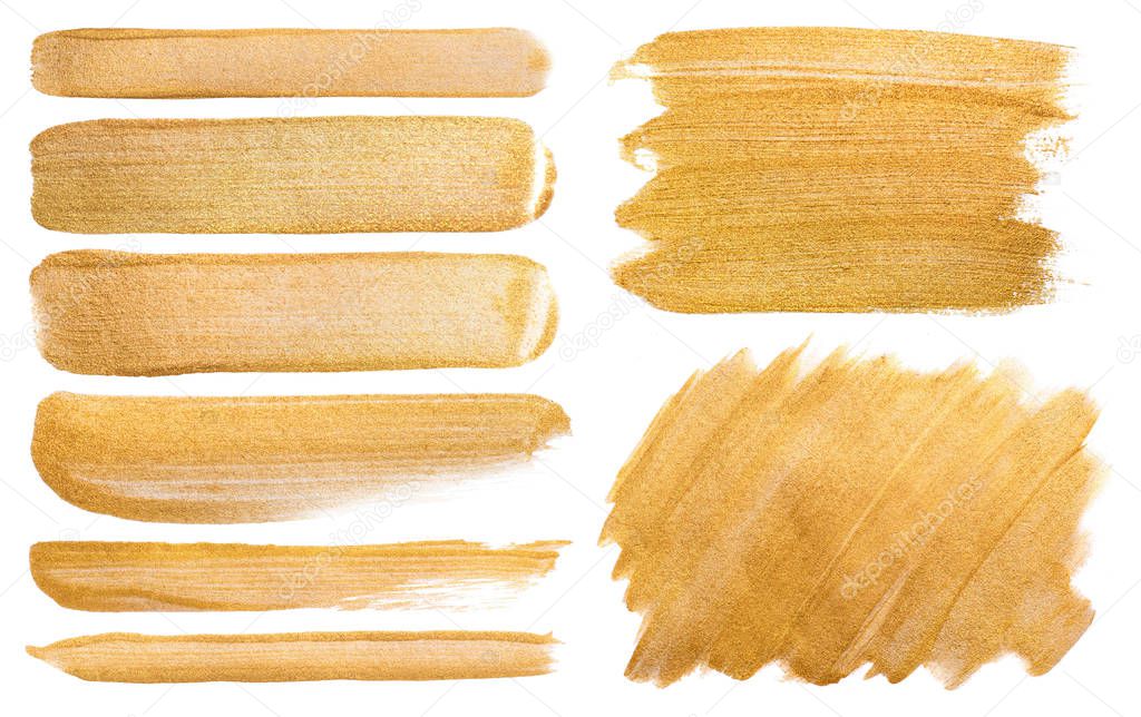 set of watercolor golden smears on a white background