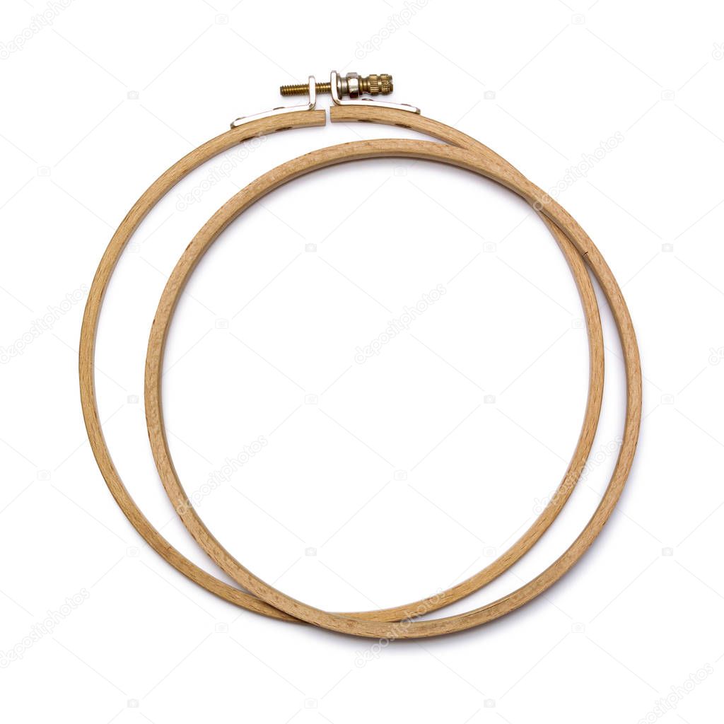 Wooden embroidery hoop isolated on white background.