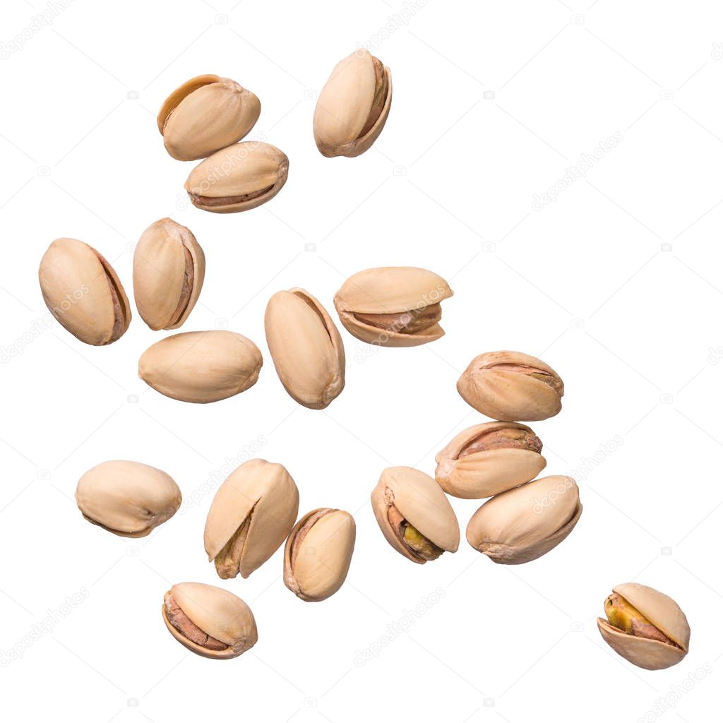 Pistachio nuts isolated on white background. Levity kernels.