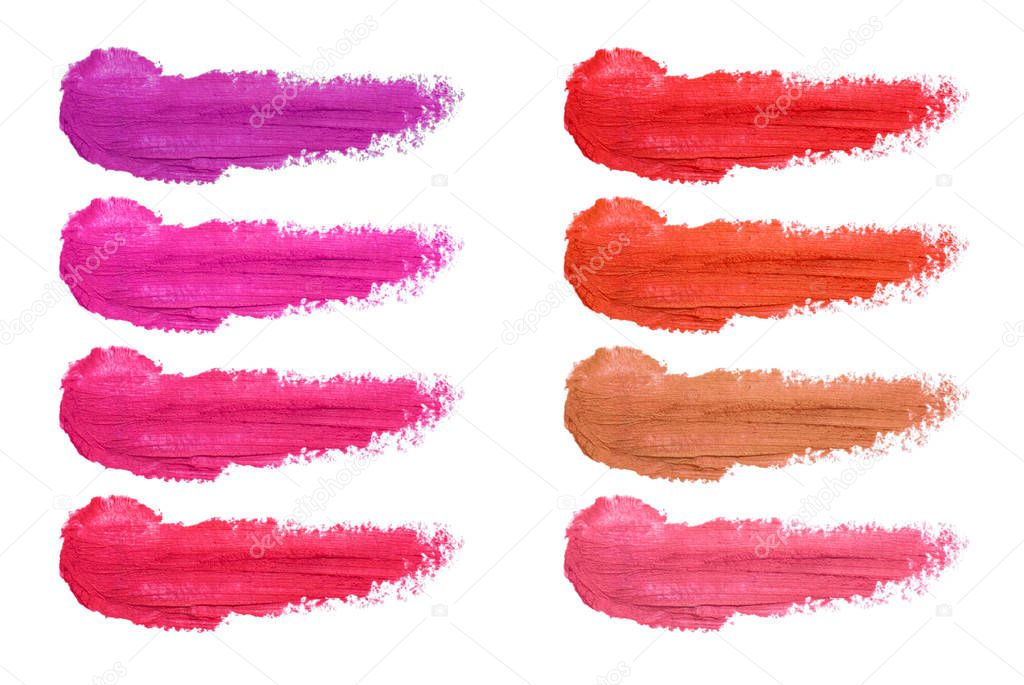 Set of lipstick smudges isolated on white background. Smudged makeup sample.