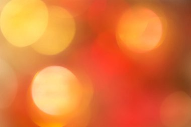 Turuncu ve kırmızı bokeh. Arka plan böke ile. Soyut doku. Bulanık renkli daireler.