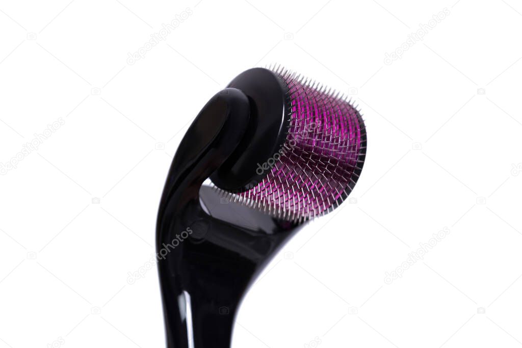 Derma roller isolated on a white background. The device for cosmetic procedures of mesotherapy.