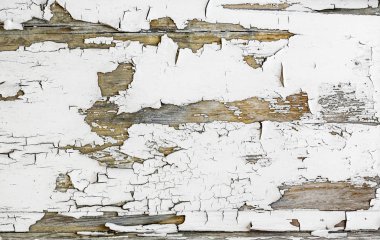 Ahşap arka planda eski kırık soyma boya deseni.