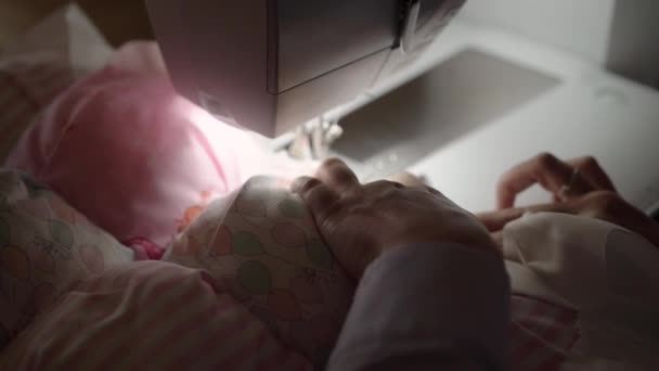 Seamstress working at sewing machine — Stock Video