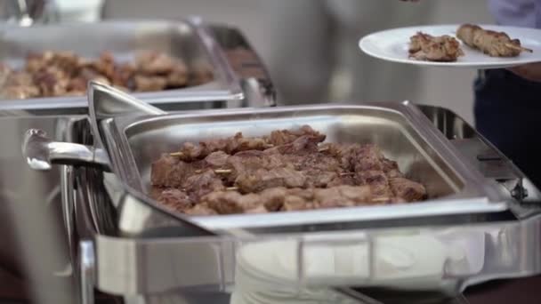 People takes meat kebab — Stock Video