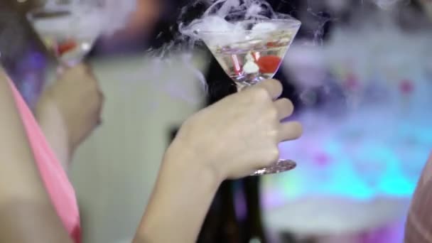 Woman takes glasses of champagne at the party — Stock Video