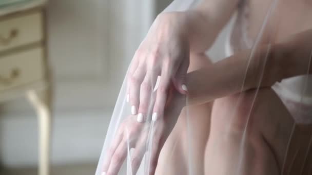 Young sexy woman in lingerie and veil — Stock Video