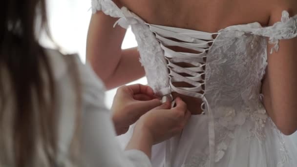 Young woman wearing bridal dress — Stock Video