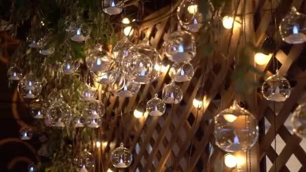 Hall of a hotel or restaurant, chandelier in the lobby, Chandelier hangs from the glass balls, creative, modern, interior, hotel or restaurant interior — Stock Video