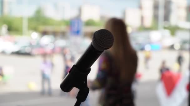 Young woman singer at stage on concert — Stock Video