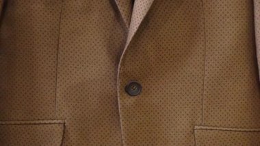 Papyon kahverengi takım elbise ceket arka plan üzerinde koyu mavi desenli. Mutlu babalar günü veya düğün kavramı.