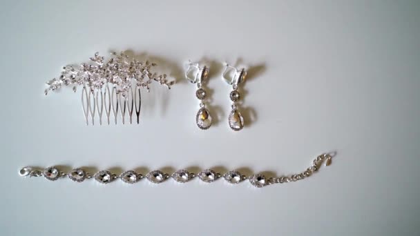 Womans jewelry earrings, bracelet and hair clip — Stock Video