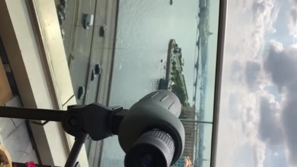 Vertical video. Cityview of cityscape from the roof panoramic terrace. — Stock Video