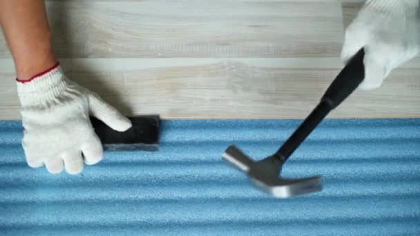Builder renovating apartment. Repair of the apartment, laying laminate flooring. Construction — Stock Footage Builder renovating apartment. Repair of the apartment, laying laminate flooring. Construction Stock Footage