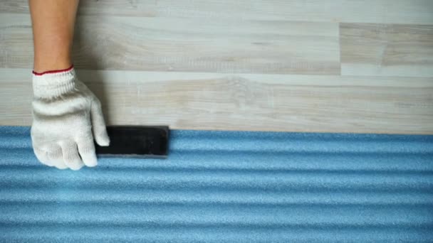 Builder renovating apartment. Repair of the apartment, laying laminate flooring. Construction — Stock Footage Builder renovating apartment. Repair of the apartment, laying laminate flooring. Construction Video Clip