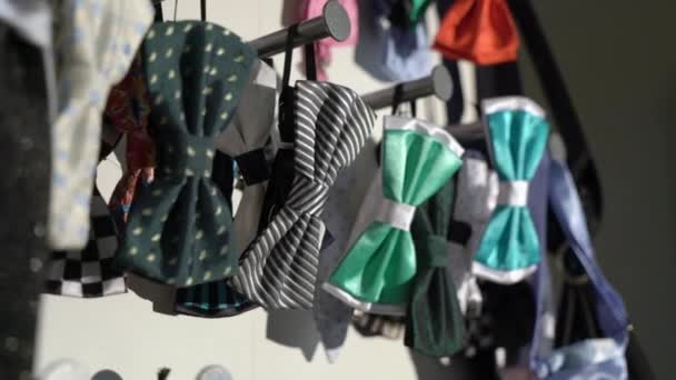 Men bow ties in a store — Stock Video