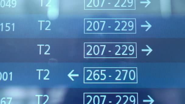 Airport timetable, departure flight information updating, international flights — Stock Video