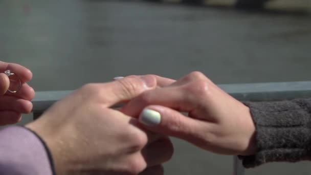 Proposal in the street with a man asking marry to his happy girlfriend — Stock Video