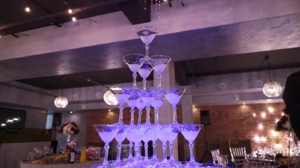 Pyramid tower of glasses for champagne at the party in restaurant — Stock Video