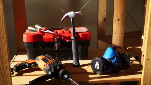 Work tools - electric drill, hammer, protective mask, box with instruments and screwdriver — Stock Video