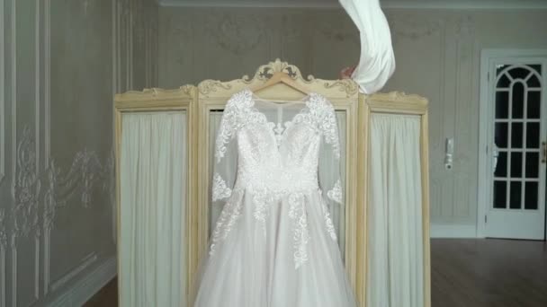 Bride undressing to put on wedding dress — Stock Video