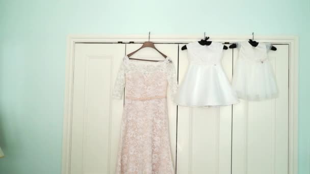 Wedding dress and dresses for children — Stock Video